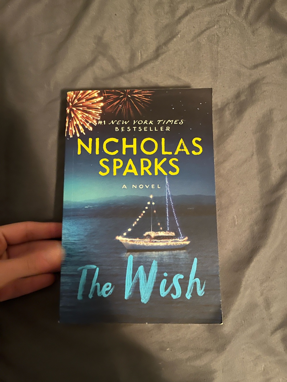 The Wish by Nicholas Sparks - Blue & Yellow Paperback Novel